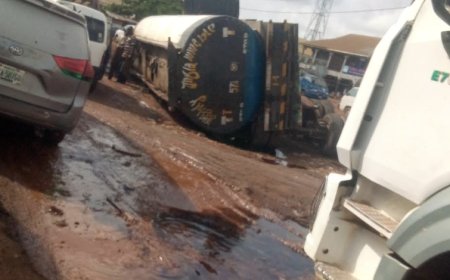 Panic as fuel tanker falls on bad Asaba-Onitsha road