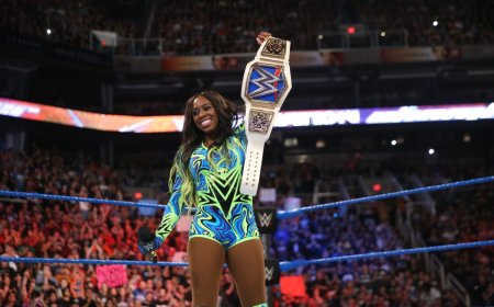 WWE’s Naomi announces pregnancy, vacates women’s world title