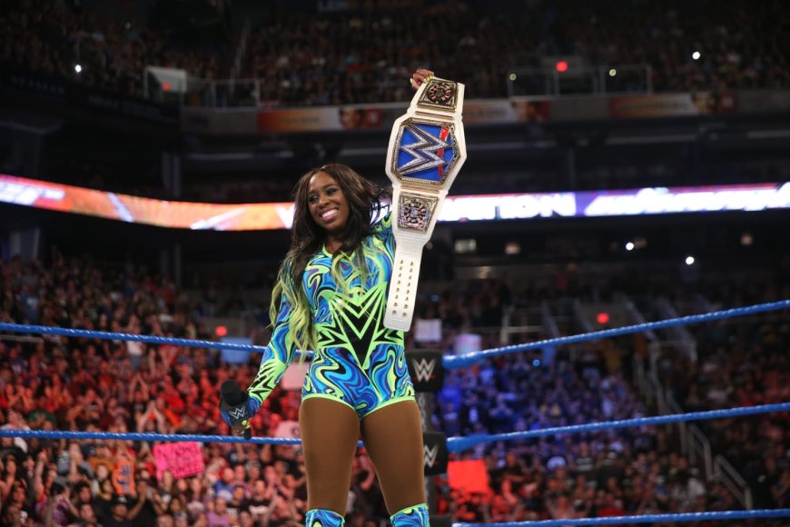 WWE’s Naomi announces pregnancy, vacates women’s world title
