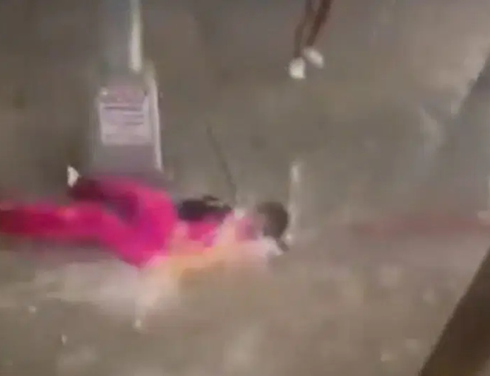 Woman swept away as flash floods paralyse New York City