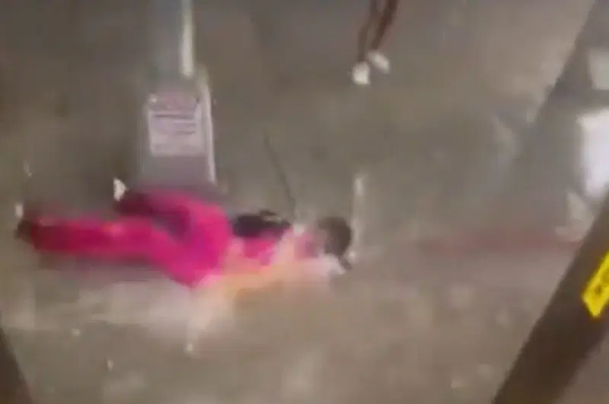 Woman swept away as flash floods paralyse New York City