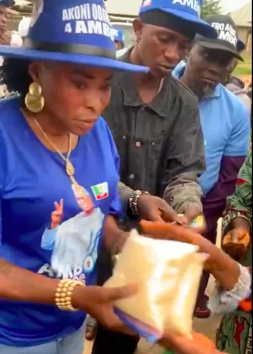 Osun woman shares rice, urges residents to vote APC candidate